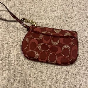 LIKE NEW- Coach maroon wristlet
